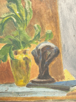 Still Life with Vibrant Green Foliage in Yellow Glass Vase Sculpture on Table
