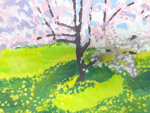 A Blooming Cherry Blossom Tree Casts Its Petals Over a Sun-Kissed Green Meadow